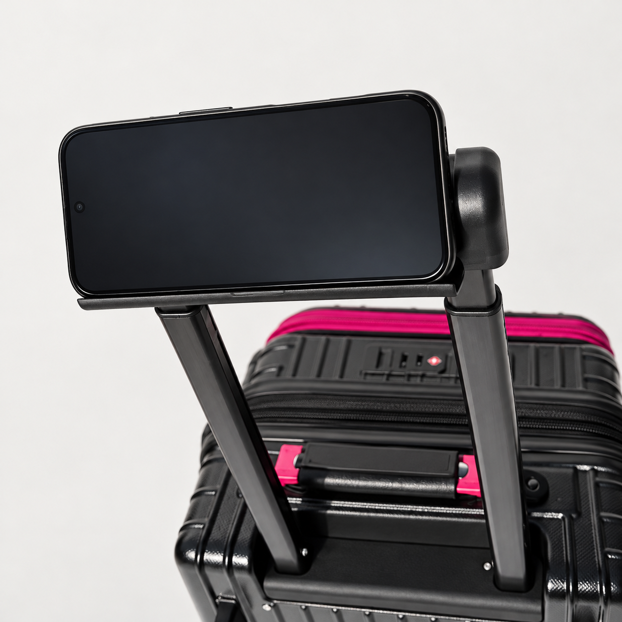 Trolley handle with fold-out phone stand